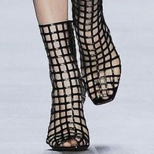 Yves Saint Laurent Patent leather ankle boots